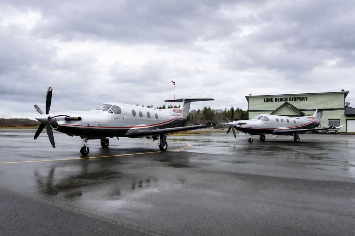 Aircraft at Long Beach Airport in Tofino with runway reflections after rain during a tour with Tofino Tour Packages